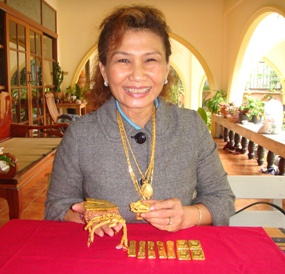 Nittaya Patimasongkroh, owner of Trathong gold shop, says gold prices are at record highs.